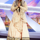 Actress Vidya Balan greets the audience. Opinion is torn on this outfit—classy or ghost-like?